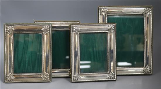 A set of three modern silver mounted photograph frames and one larger frame, Harrods Ltd, Sheffield, 1992/3, largest 22.5cm
